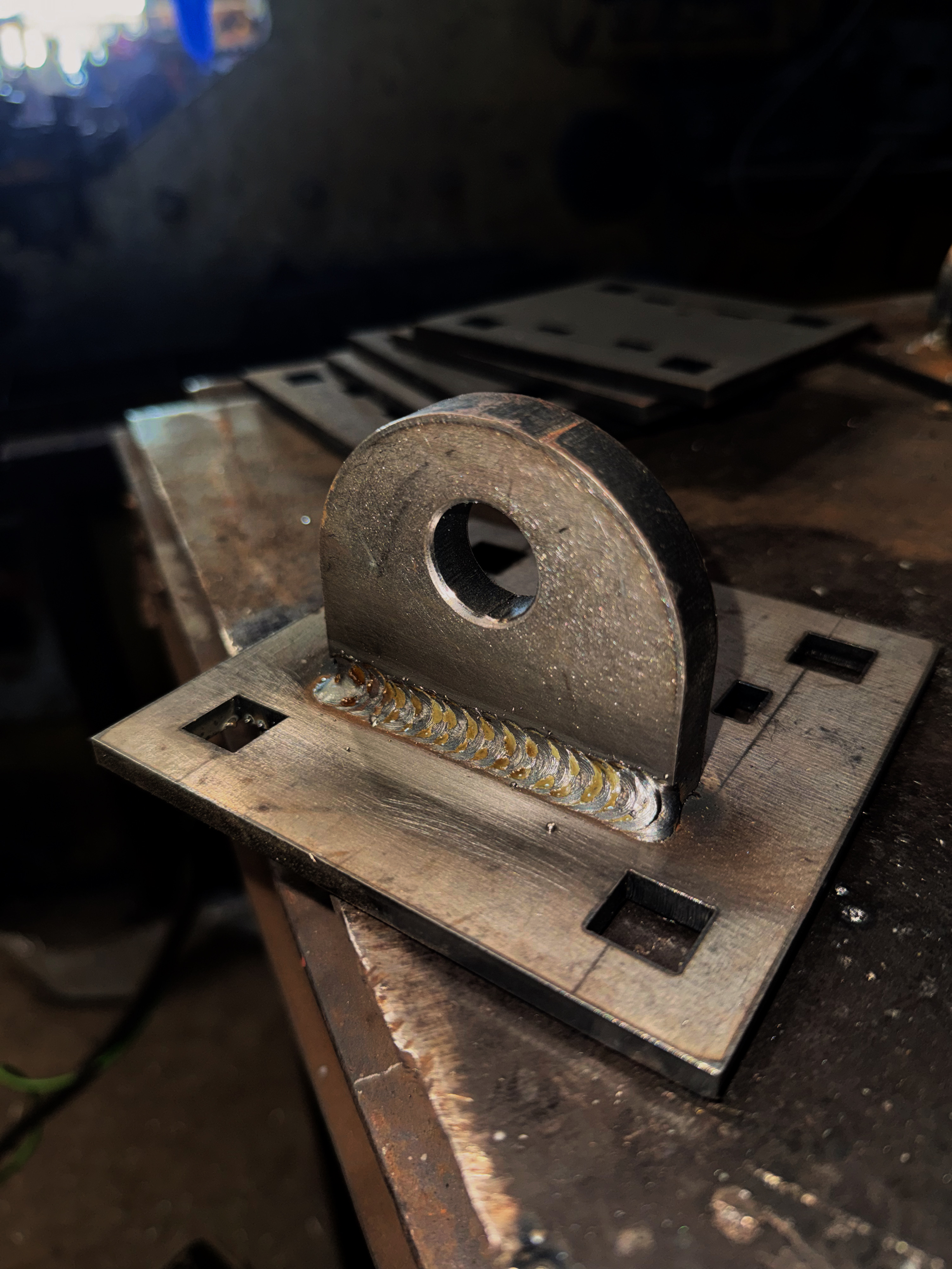 Precision weld bead on fabricated steel bracket